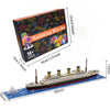 A building block set of a Titanic ship model kit shown assembled on a blue baseplate.