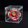 A red and silver Valkyrie Volt S4-70V metal spinning top with launcher displayed inside a clear plastic box.