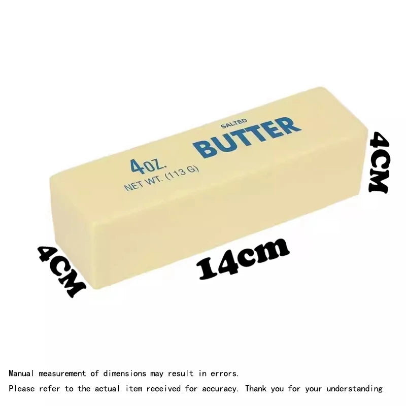 A rectangular block of salted butter, approximately 4 oz in size, used as a fidget toy.