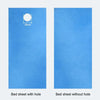 A comparison showing a bed sheet with a hole and a bed sheet without a hole, both in light blue.