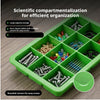 A green multi-compartment storage box with rounded corners holding various hardware and small items for organized storage.