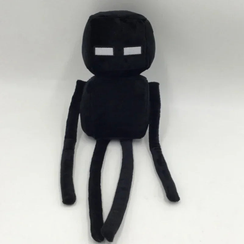 A black soft plush doll resembling a Minecraft character with a square white eye and limbs.