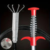 A silver drain auger with a coiled shaft and a red claw grabber is shown against a black background.