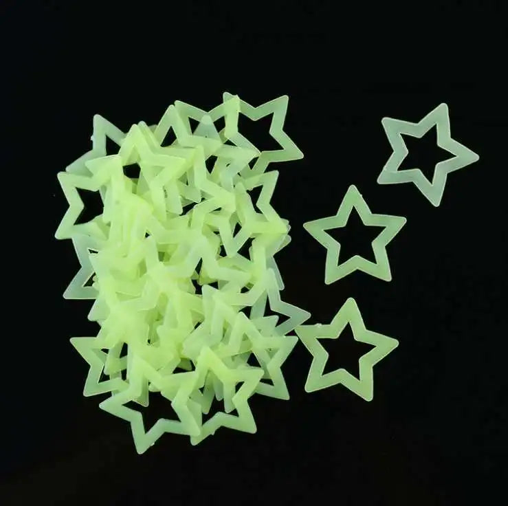 A pile of translucent, glow-in-the-dark 3D star wall stickers for kids' rooms and bedrooms.