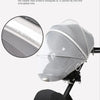 A gray universal mosquito net cover for a baby stroller or crib, shown with a magnified view of the mesh.