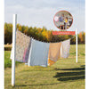 A clothesline strung between two poles displaying various garments outdoors.
