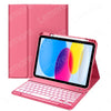 A pink iPad keyboard case with a matching pink cover and a screen displaying a colorful image.