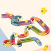 A set of colorful bath time duck slide toys for toddlers, featuring various colored plastic slides and a yellow duck figure.