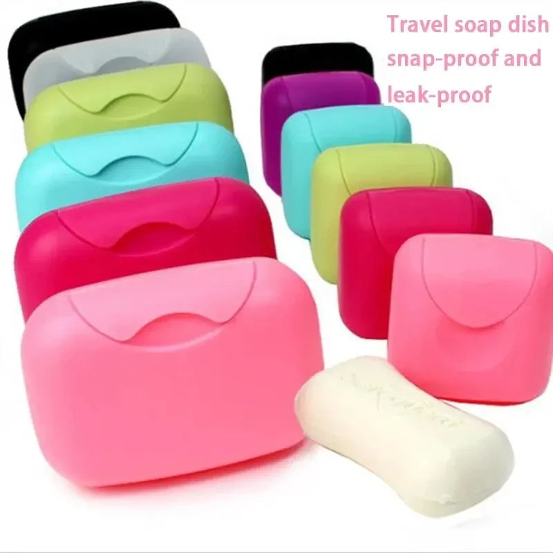 A collection of colorful, snap-proof travel soap dishes and a white soap bar shown in various shades.