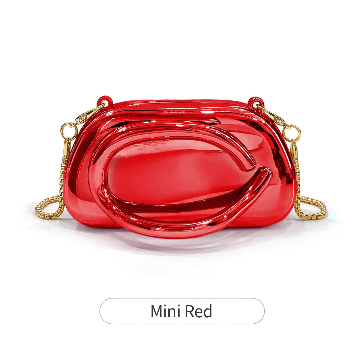 A shiny red mini clutch bag with gold metal hardware.