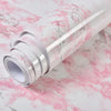 Roll of self-adhesive pink marble wallpaper for furniture and countertops