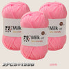 Three skeins of pink silk-friendly milk cot yarn are displayed against a light background.