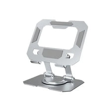 A silver foldable tablet stand with a rotating mechanism for viewing.