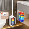 A white wall-mounted dispenser for disposable toilet cleaning refills with colorful cylindrical containers.
