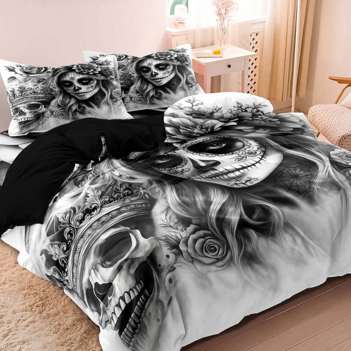 A black and white duvet cover featuring a detailed sugar skull design with floral accents.