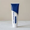 A tube of Wall Repair Paste contains a scraper, nail hole, and quick repair tools for drywall fixes.