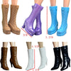 A set of fashion doll accessories including brown and purple boots in various heights and colors