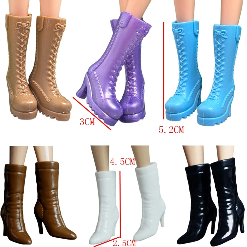 A set of fashion doll accessories including brown and purple boots in various heights and colors