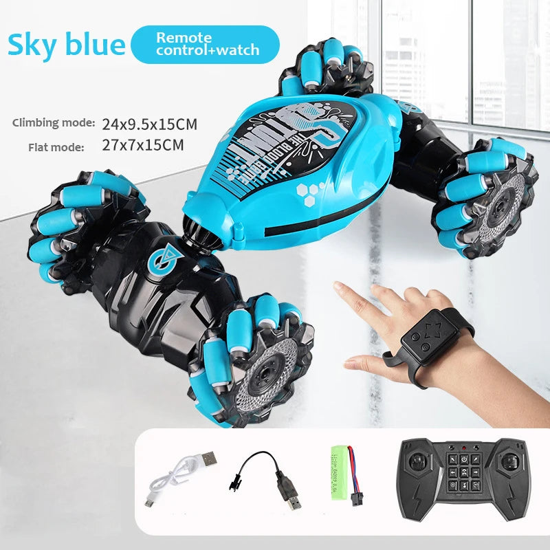 A blue remote control watch and climbing/flat mode accessory for an RC stunt car.