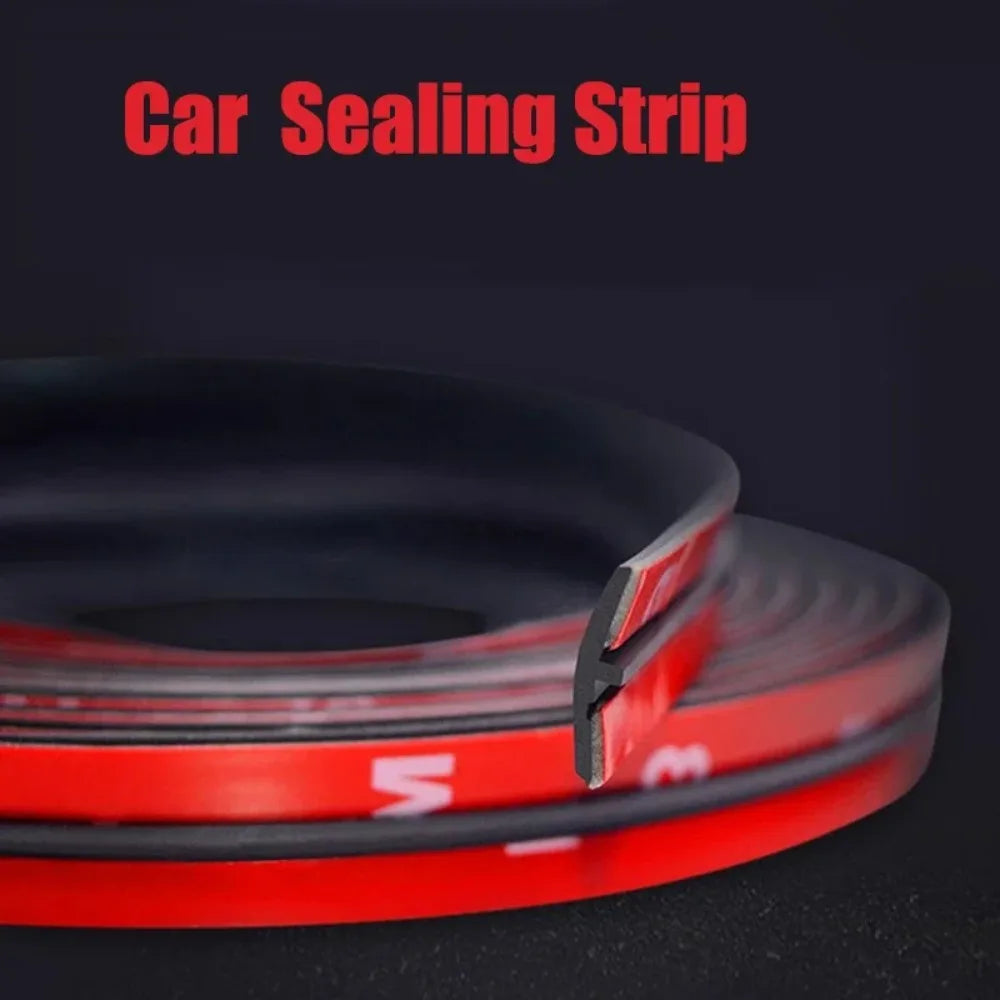A close-up view of a red and black car sealing strip used for weatherproofing vehicle gaps.