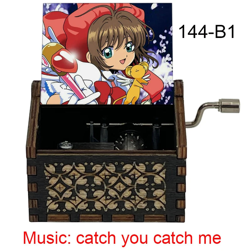 A wooden music box featuring a Cardcaptor Sakura character, with the title Catch You Catch Me visible.