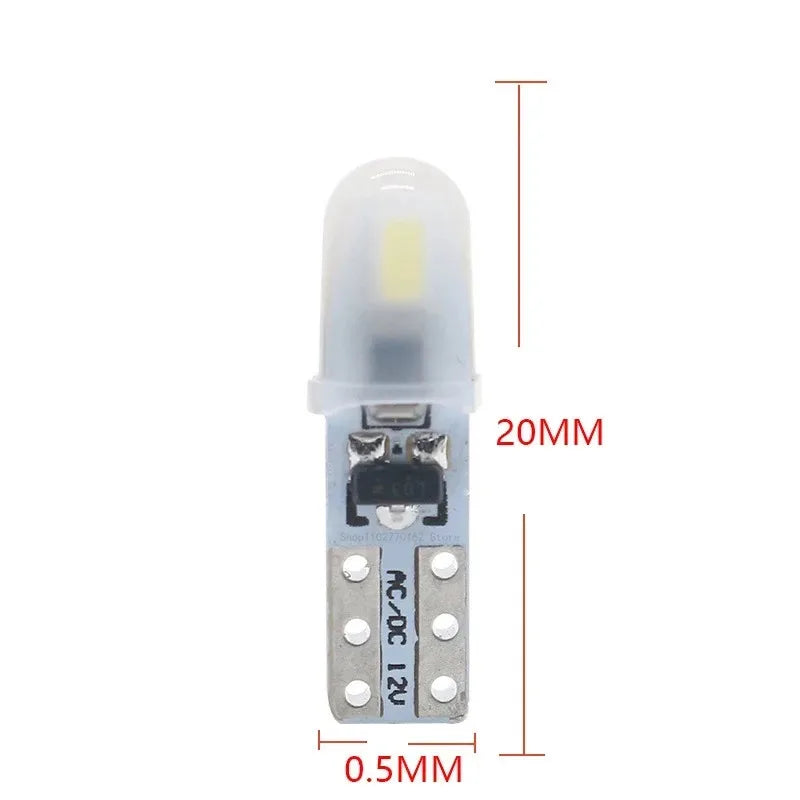 A white T5 wedge LED bulb with a clear lens and silver base, measuring 20mm in length.