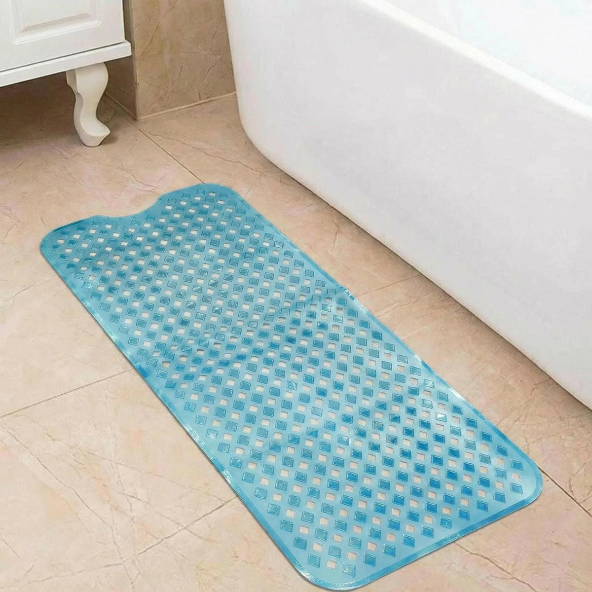 A rectangular blue non-slip bathtub mat with suction cups placed on a tiled floor.