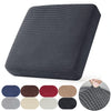 A dark gray jacquard stretch sofa slipcover with a textured weave shown alongside color options.
