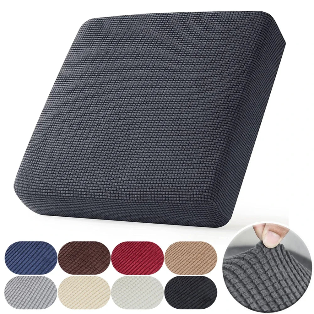 A dark gray jacquard stretch sofa slipcover with a textured weave shown alongside color options.