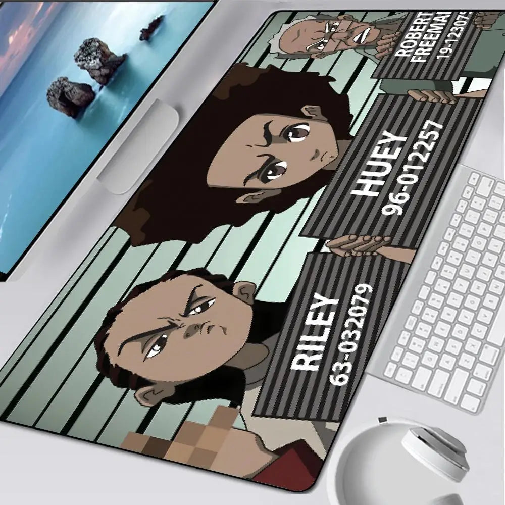 An oversized gaming mouse pad featuring characters from The Boondocks on a light green background.