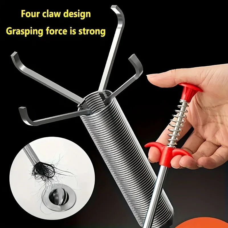 A hand holds a silver drain auger with a red claw grabber, demonstrating its strong grasping force for removing hair or clogs