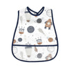 A white baby feeding bib with a catch pocket featuring space-themed patterns like planets and stars.
