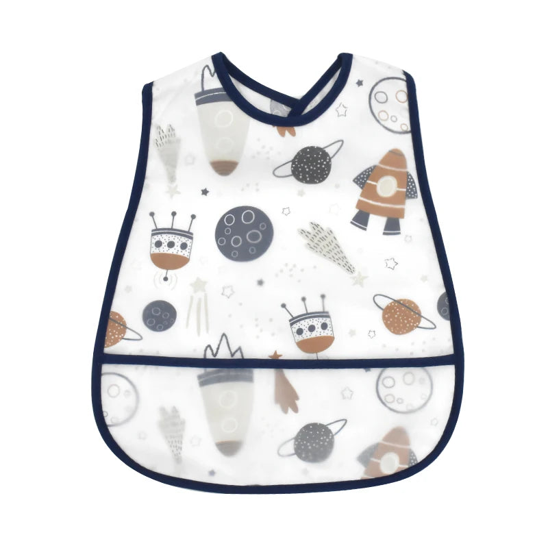 A white baby feeding bib with a catch pocket featuring space-themed patterns like planets and stars.