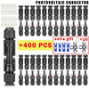 A collection of black photovoltaic connectors and extra gift tools for PV cable installation