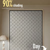 A close-up of a window covered with a diamond-patterned gray thermal film, demonstrating sun glare reduction.