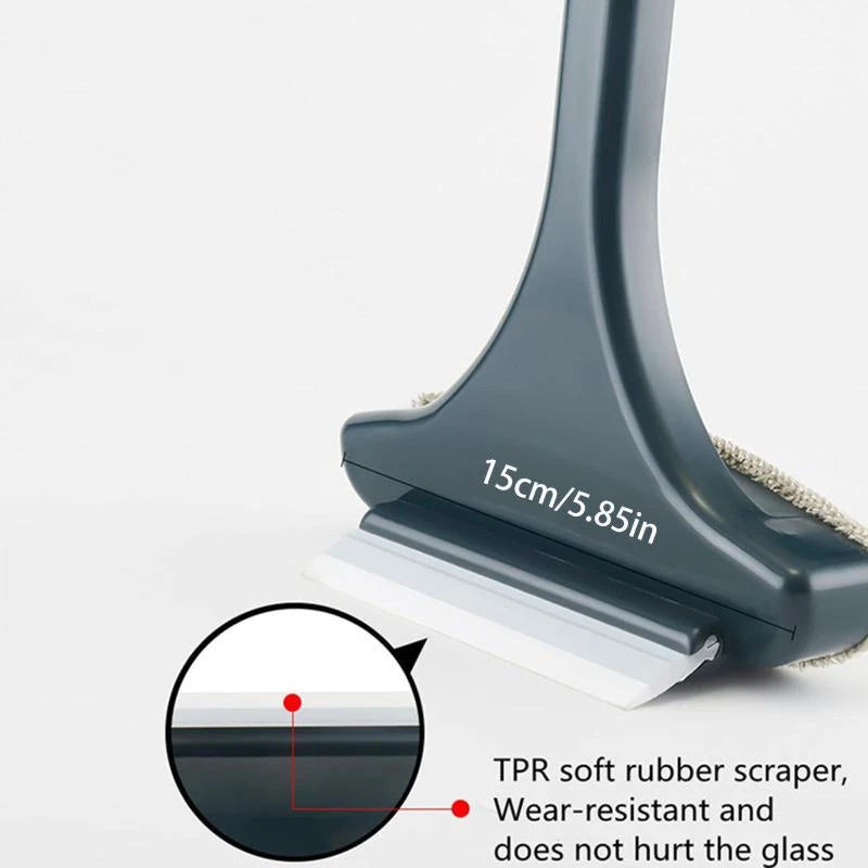 A close-up view of a gray window cleaning brush with a white scraper blade, designed for scratch-free glass cleaning.