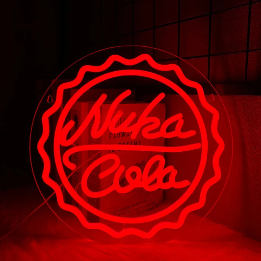 Red neon sign of a bottle cap design for Nuka Cola illuminated against a dark background.
