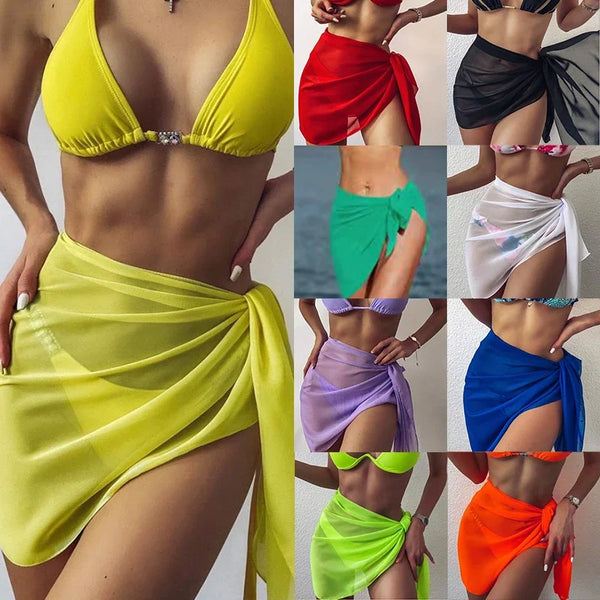 A collection of women wearing various colored lightweight chiffon beach wrap and bikini cover-up garments.