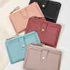 A collection of five women's slim PU leather card holder wallets in shades of pink, mauve, and black.