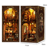 A wooden book nook kit featuring a detailed scene with figures and LED lighting.