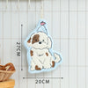 A light blue cartoon dog hanging towel with a pink star detail, displayed against a white tiled background.