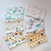 A collection of soft cotton baby pillowcases featuring various nature and animal cartoon designs.