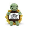 Handmade crochet hedgehog doll with a smiling face and an inspirational card
