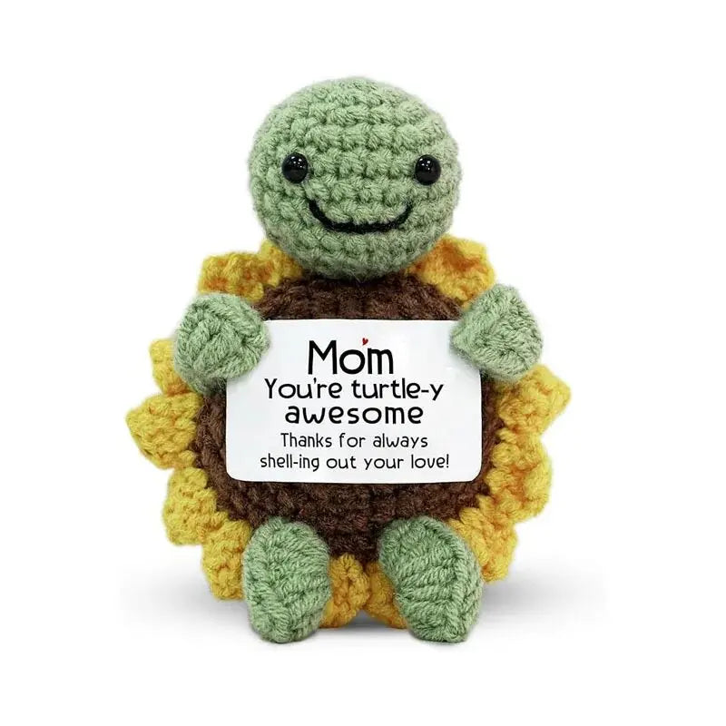 Handmade crochet hedgehog doll with a smiling face and an inspirational card