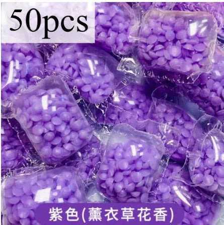 50 pieces of purple water-soluble laundry fragrance beads packaged in clear plastic.