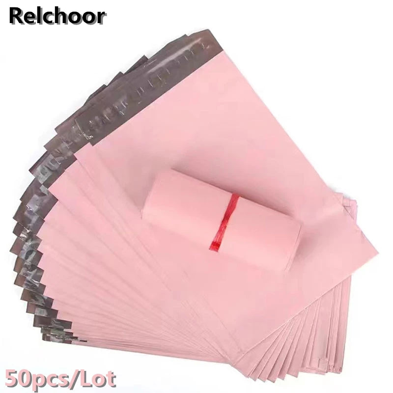 A stack of 50 pink waterproof poly mailer shipping bags.