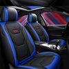 Close-up view of various universal leather car seat covers in black, blue, and tan colors.
