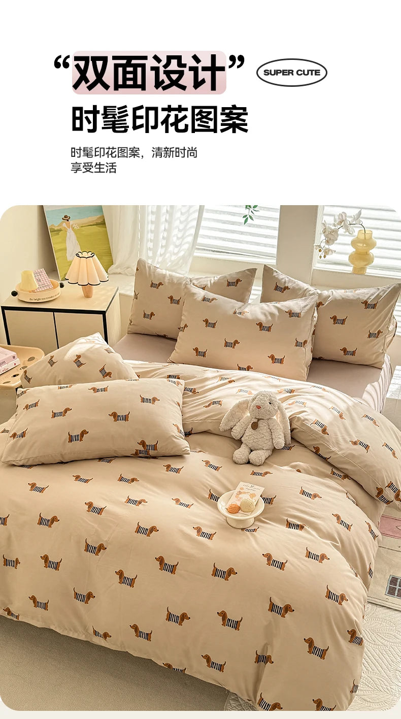 A beige duvet cover set featuring a repeating pattern of small brown dogs on a light tan background.