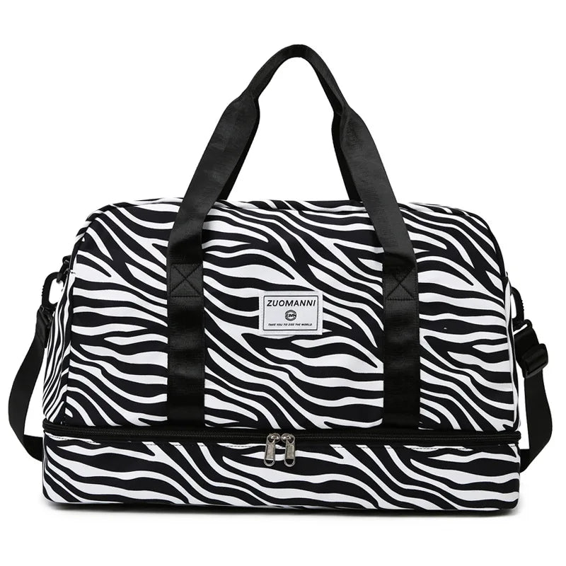 Black and white zebra print duffle bag with wet/dry compartments