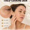 A woman is shown applying a facial massage to her skin, illustrating how daily massage helps awaken tired-looking skin.